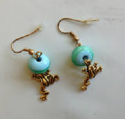 blue_striped_frog_earrings.jpg